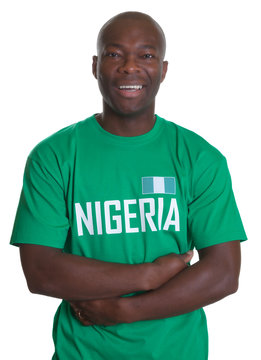 Soccer Fan from Nigeria with crossed arms