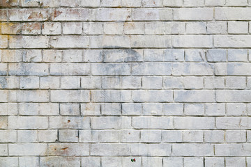 White painted grunge brick wall texture background