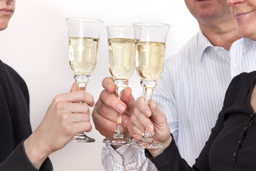 People celebrating with champagne your success