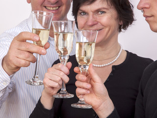 People celebrating with champagne your success