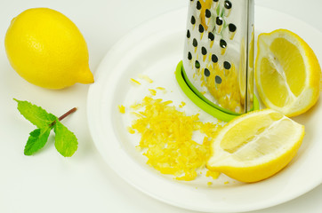 Lemon and lemon zest with grater