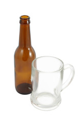 Top side of bottle and glass on white background.