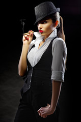 Young woman with cigar