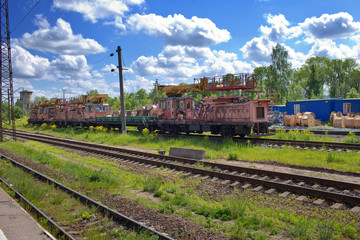 Fototapeta premium The auxiliary working train at station in rural areas
