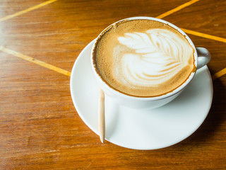 latte coffee on wood table