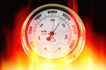 Barometer indicating very dry conditions on a black background.