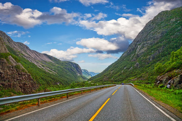 Lonely car on the mountain road in Norway.