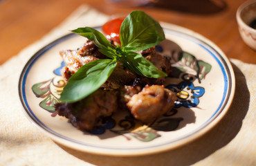 Grilled shashlik with vegetables on plate