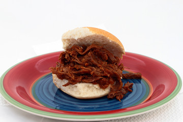 Shredded Beef Sandwich On Colorful Plate