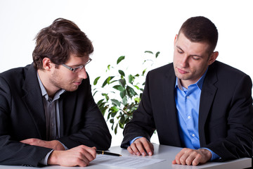 Businesmen consulting an angreements