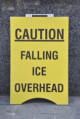 Caution falling ice overhead sign