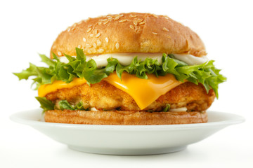 Fish burger with cheese and mayonnaise on dish - 63150691