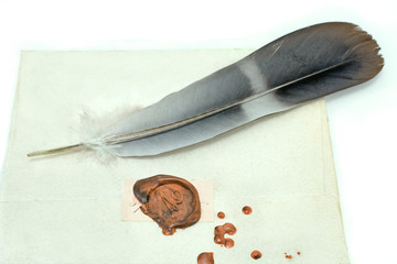 Wax sealed letter with quill  on white
