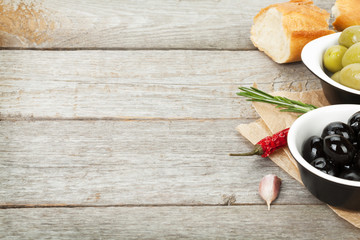 Italian food appetizer of olives, bread and spices