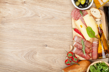 Cheese, prosciutto, bread, vegetables and spices
