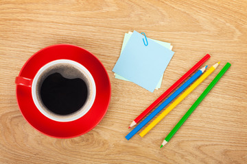 Blank post-it with office supplies and coffee cup