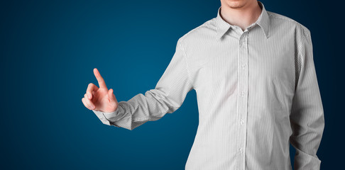 Businessman pressing imaginary button