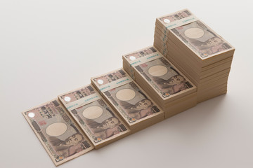 グラフのように積上げた紙幣