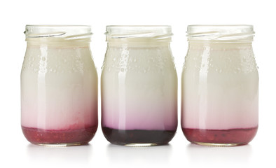 three jars with fruity yogurt