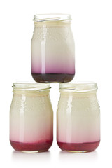three jars with fruity yogurt