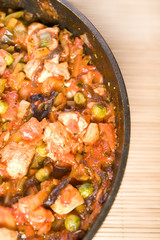 chinese food chicken with vegetables in tomato sauce