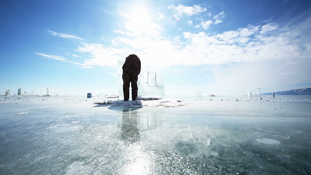 Man Cuts Ice, Preparing the ice for further processing