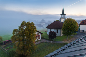 Le Brassus, Switzerland in a foggy winter morning.