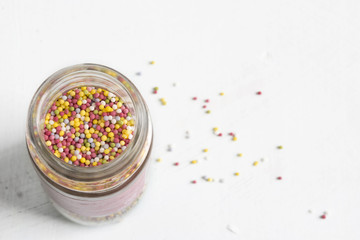 a lot of sprinkles, in glass jar