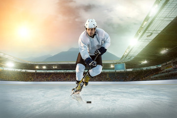 Ice hockey player on the ice. Open stadium - Winter Classic game