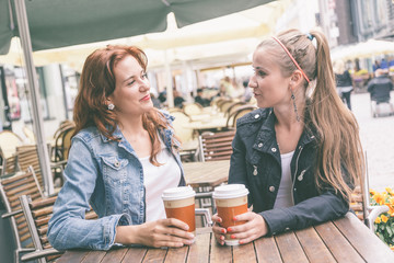 Teenage Girls Drinking at Bar