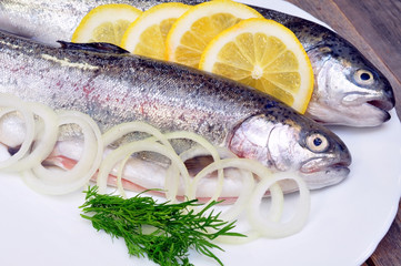 two fresh trout and lemon