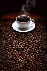 cup of coffee with beans