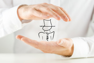 Man holding a hand-drawn figure