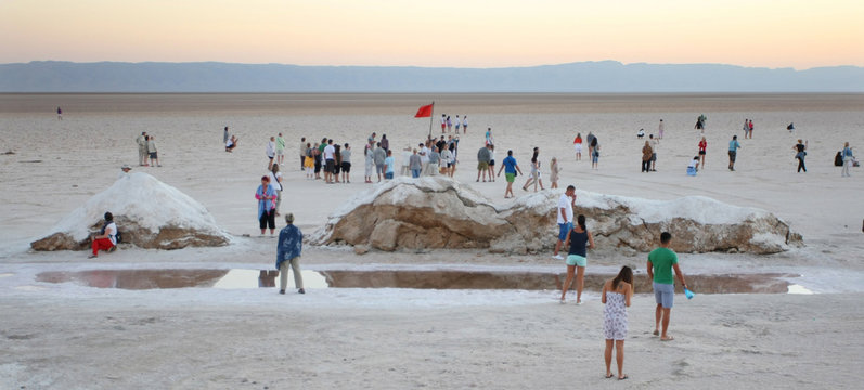 Tourists at salt lake Chott El Jerid