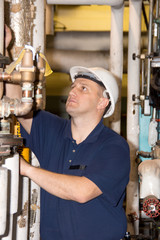Engineer with hard hat in power plant