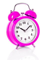 pink alarm clock isolated on white background