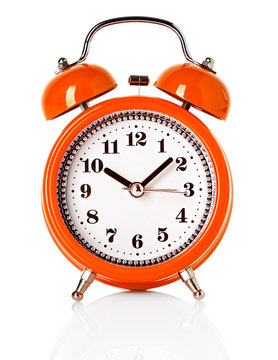orange alarm clock isolated on white background