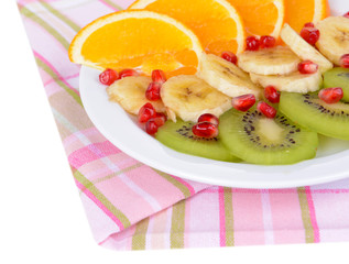 Sweet fresh fruits on plate on table close-up