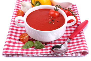 Tasty tomato soup and vegetables, isolated on white