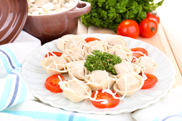 Meat dumplings - russian boiled pelmeni close up