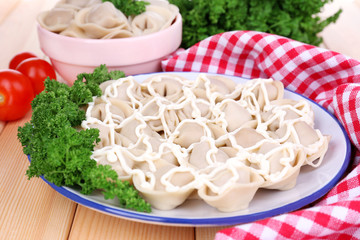 Meat dumplings - russian boiled pelmeni close up