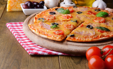 Tasty pizza on table close-up