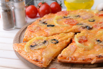 Tasty pizza on table close-up