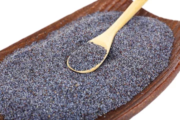 Foto op Canvas Poppy seeds in bowl close-up © Africa Studio