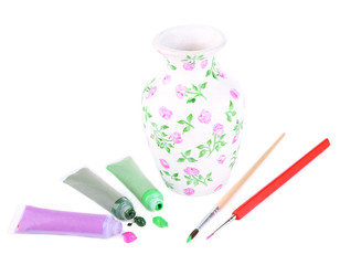 Beautiful hand made vase and art materials, isolated on white