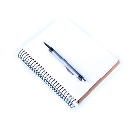 Notebook with pen isolated on white
