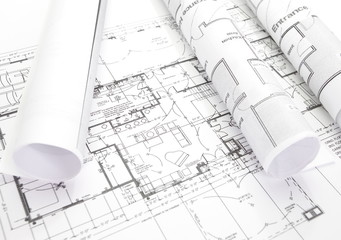 close - up Architect rolls and plans architectural plan