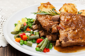 Pork spareribs served with mashed potatoes