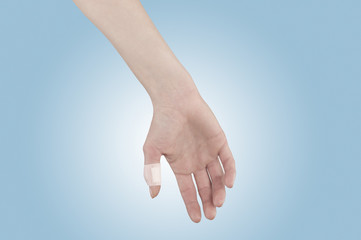 Adhesive Healing plaster on finger.