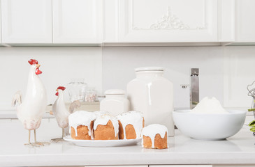 Easter cakes and cock are on kitchen